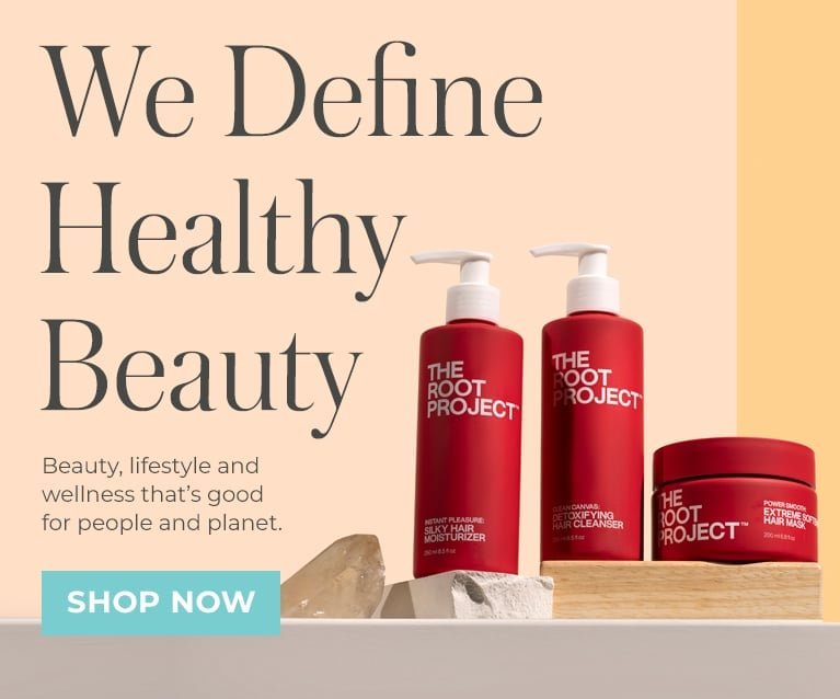 Beauty Heroes: We Define Healthy Beauty | The Root Project | Group image of red bottles with white pumps on shelf on peach background