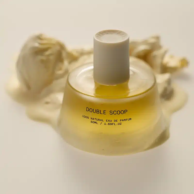 Abel Fragrances Double Scoop in fron of two scoops of vanilla ice cream