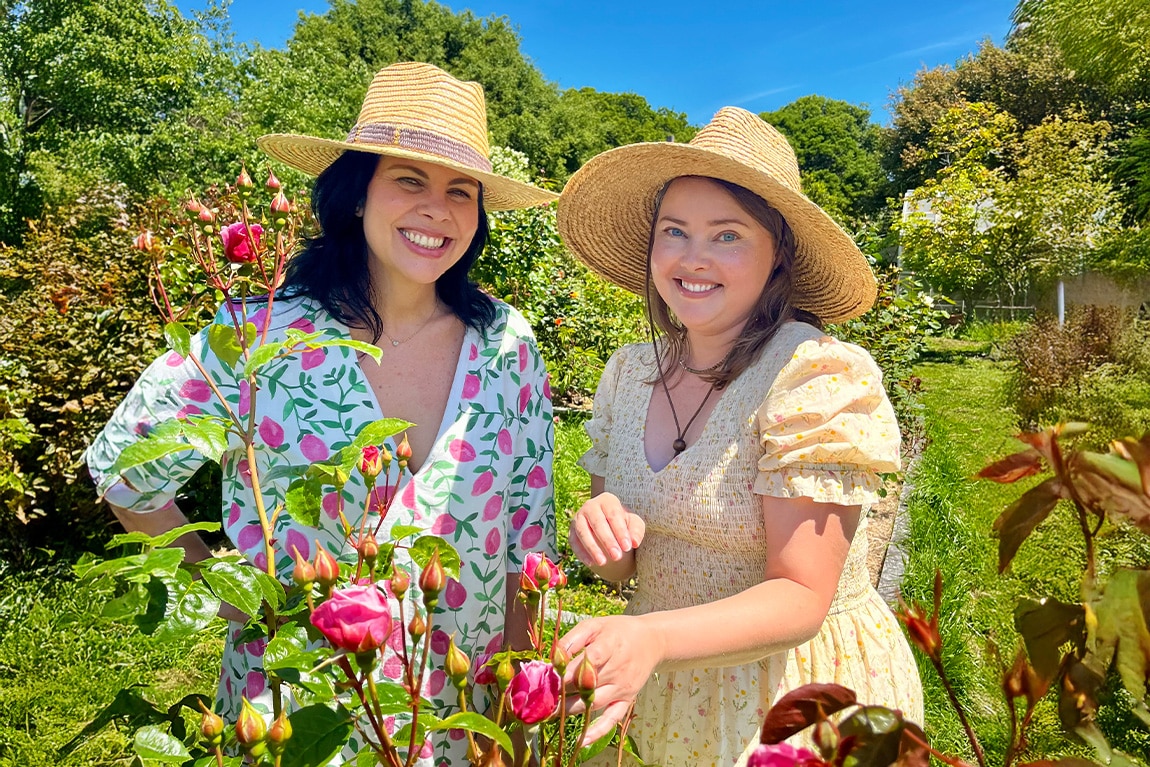 Jeannie and Laurel in a Rose Garden