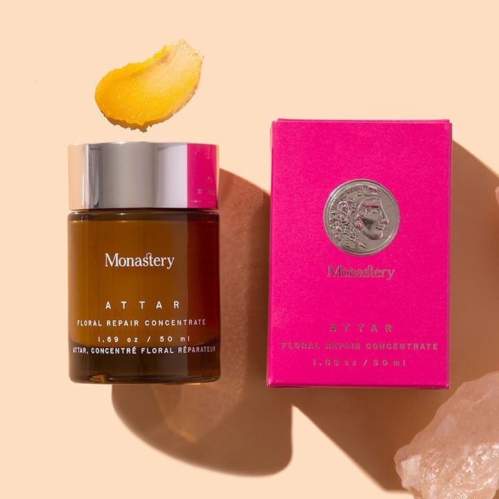 Monastery | Attar Floral Repair Concentrate | Amber jar with pink box and product swatch on beige background