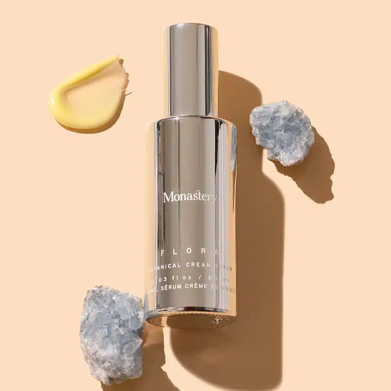 Monastery Flora Botanical Crea, Serum against a beige background