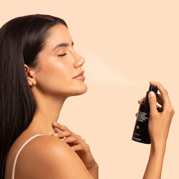 A skincare model applying a facial hydramist by de Mamiel