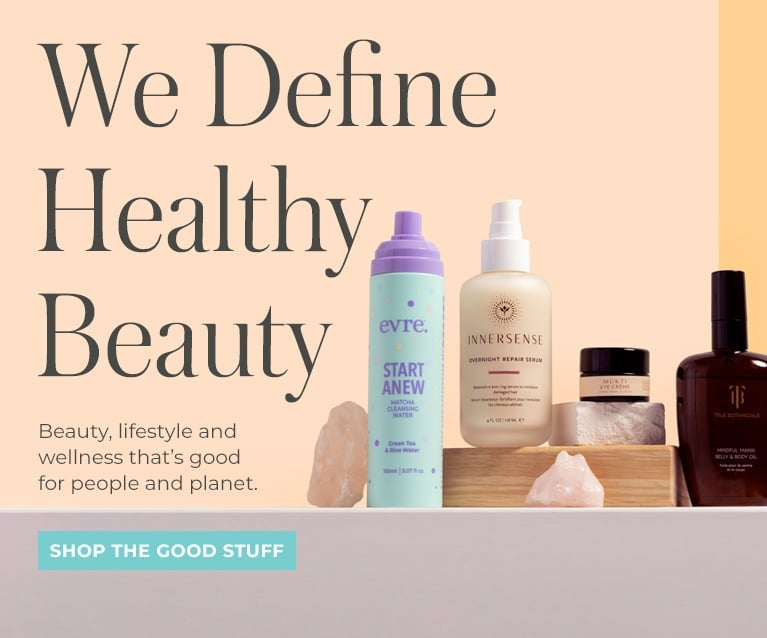 Beauty Heroes | We Define Healthy Beauty | Group image of multiple products on shelf on peach background